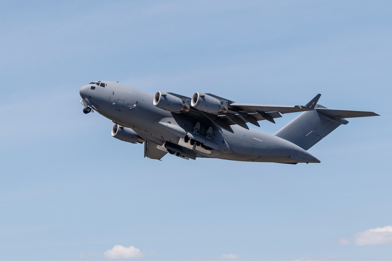 A C-17 Globemaster III heavy military transport plane in flight