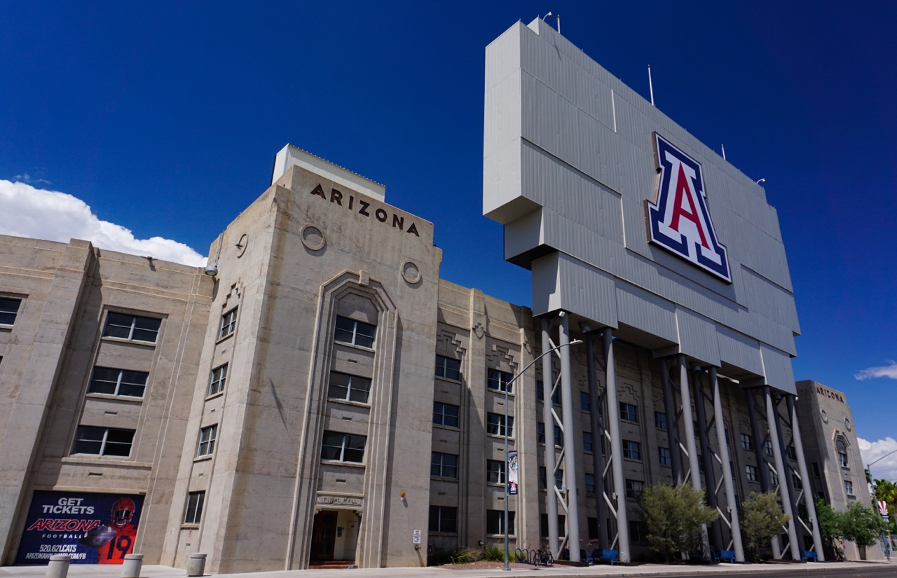 Tucson, Arizona USA - July 23, 2019: Southern end of Arizona Stadium at the University of Arizona. Pinal Hall dormitory left, scoreboard